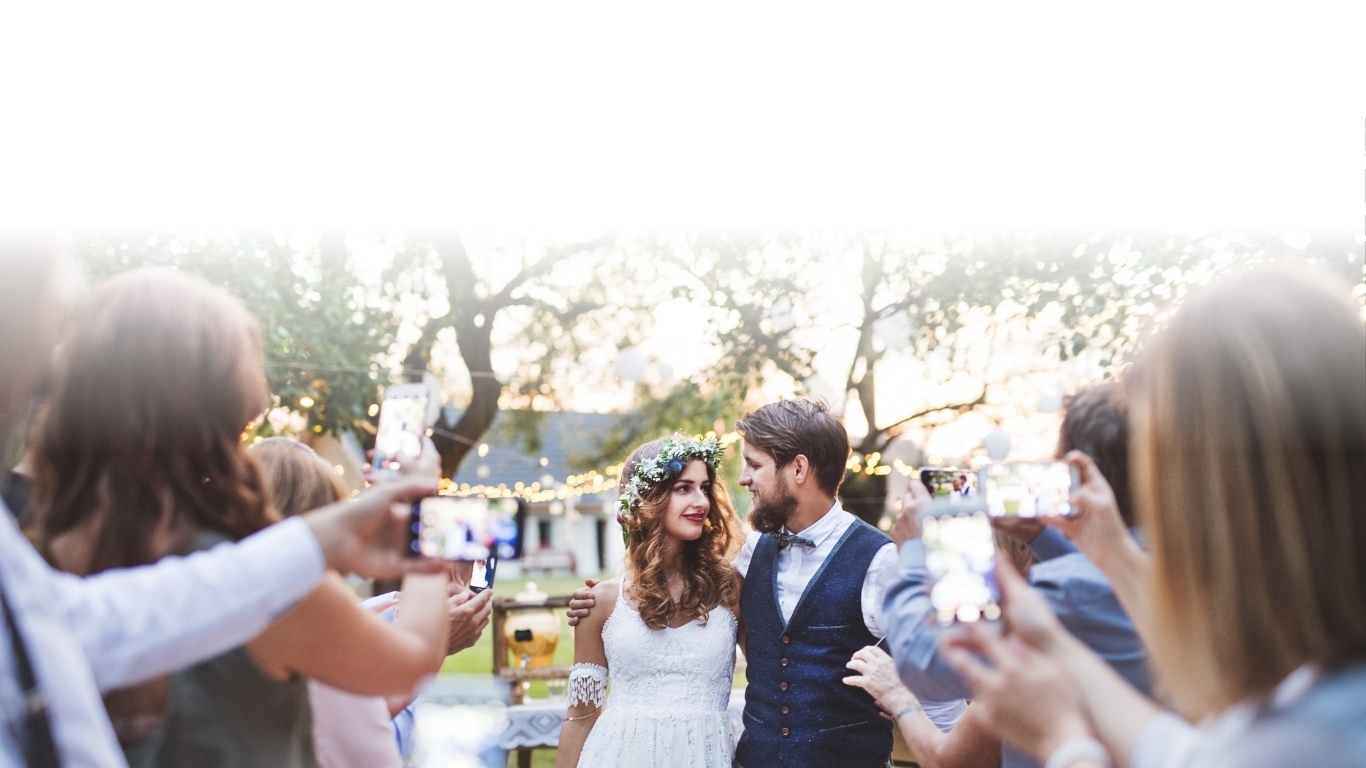 SynqEvent background - people at an event sharing memories